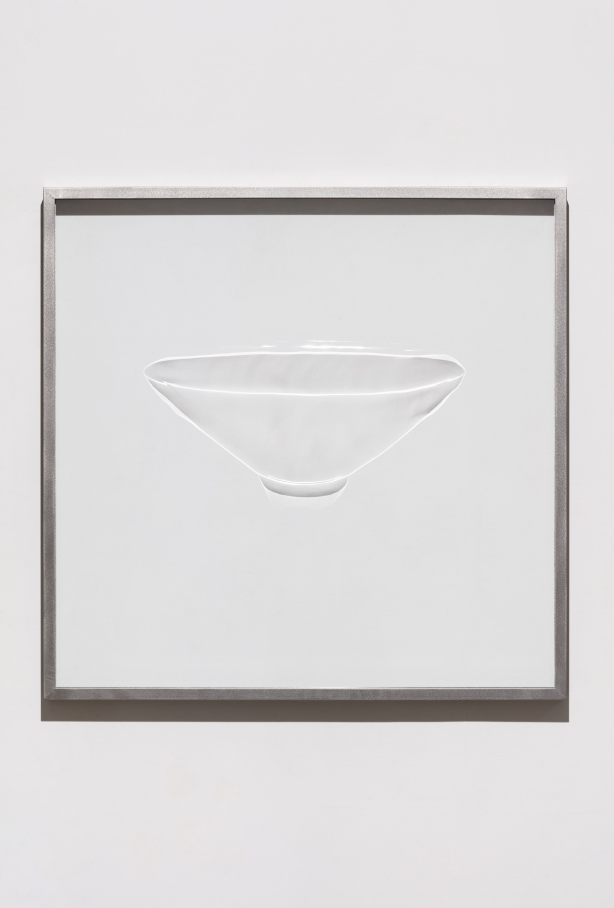 Celadon Bowl, Reverse inlay design of arabesque scrolls